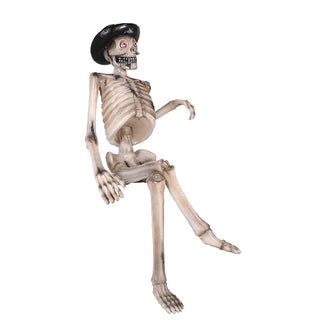 SKELETON SITTING ON A BENCH