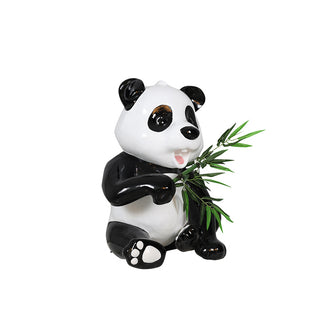 Panda Cub Eating Bamboo